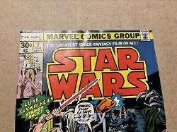 Star Wars #1, #2. 1st Print Marvel 1977 See Pics. Ink Back cover